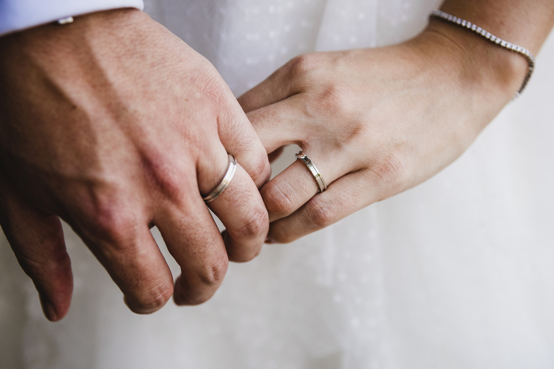 Married Couple Holding Hands